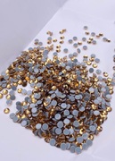 Стеклянные термоклеевые стразы DMC16-110 золото